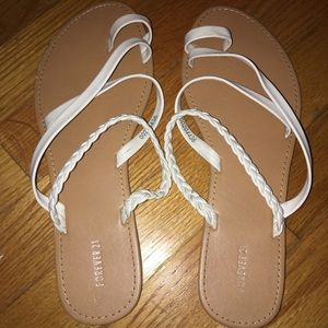 White strappy slip on sandals